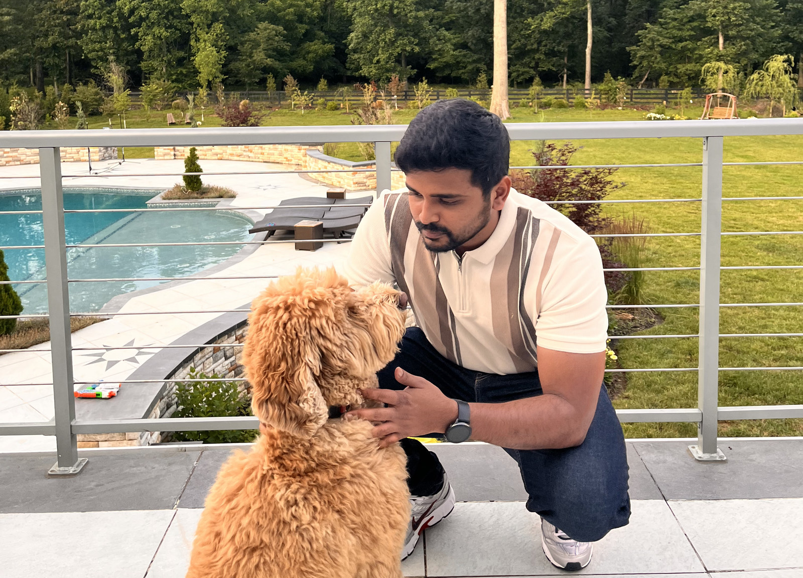 Ankit Dongare outdoors with a dog